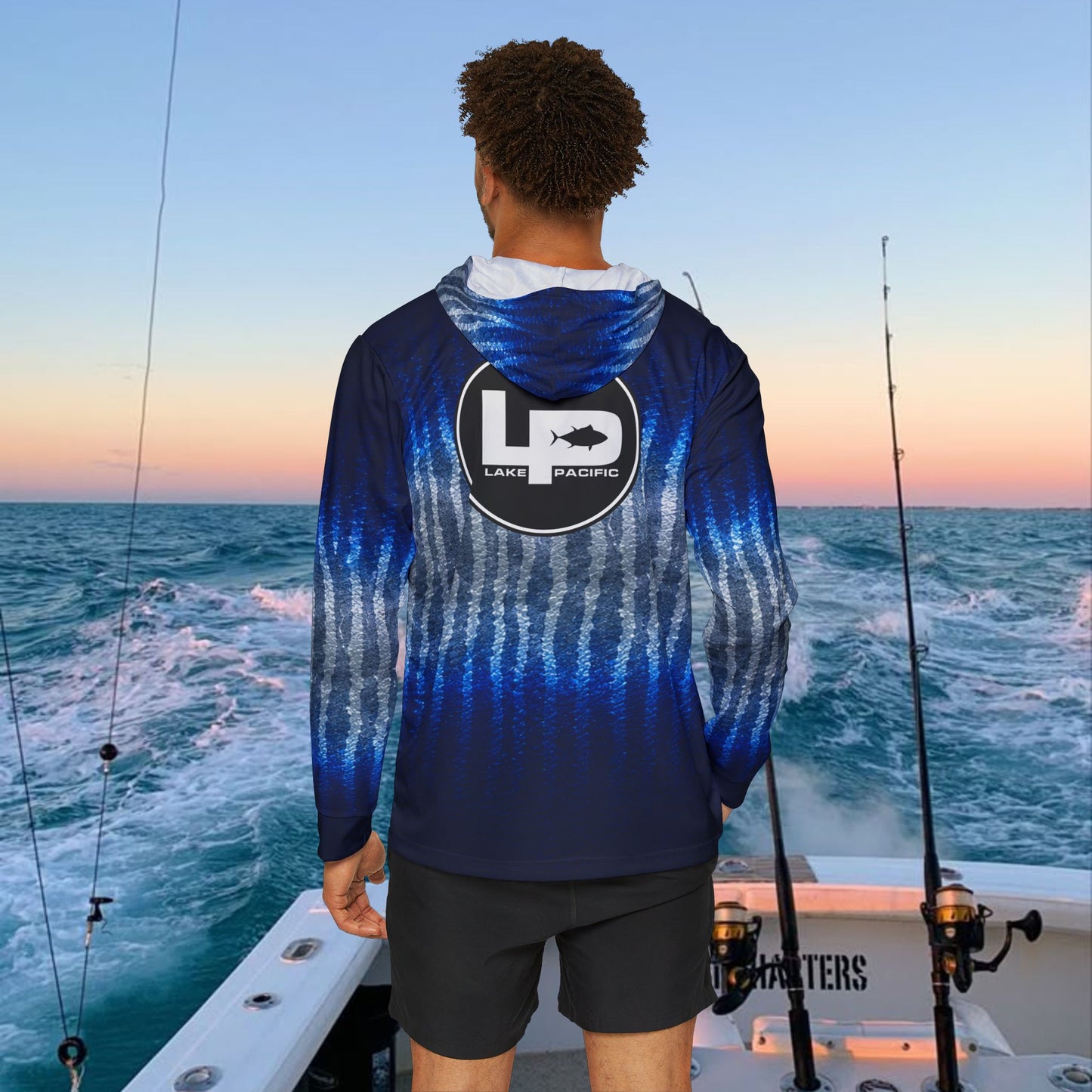 Angler wearing Lake Pacific Wahoo performance fishing hoodie offshore