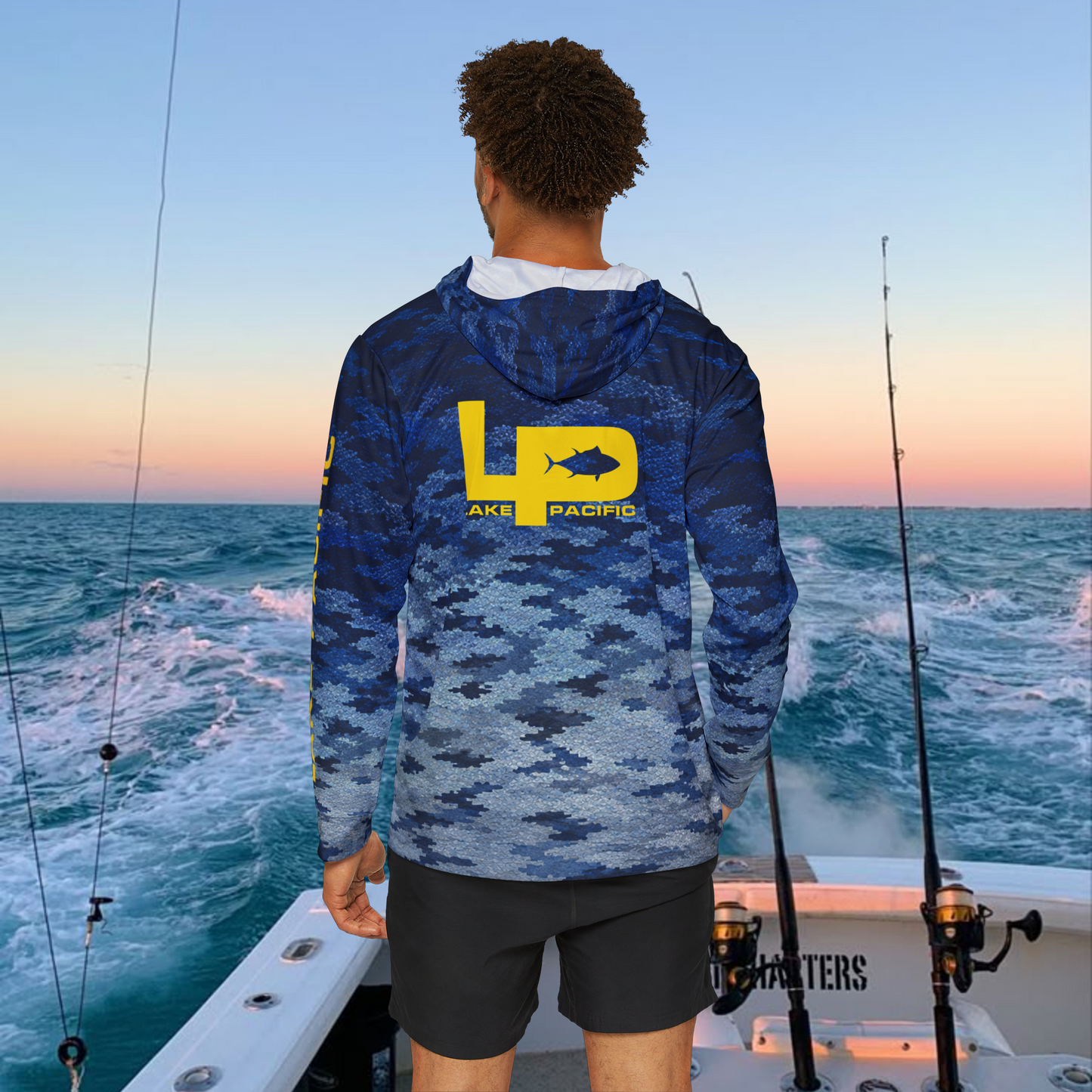 Angler wearing Lake Pacific Bluefin performance fishing hoodie offshore